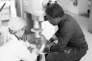 Alison and Conroy, experts in how to start a food truck, work together to make their Jamaican patties for JA Patty