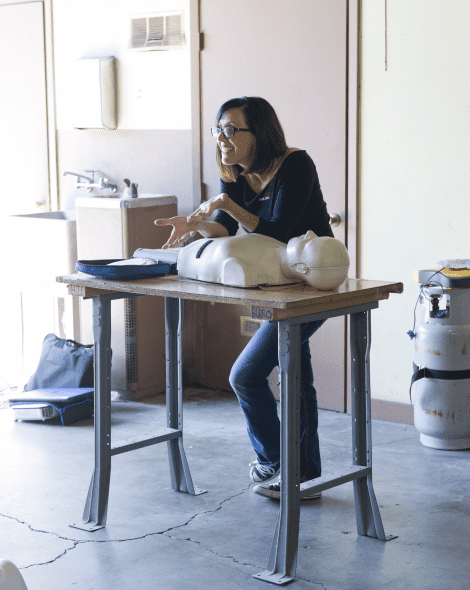 Shannen teaching a class CPR