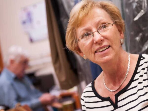 Female business owner, and women-owned business certification holder, at her place of work.