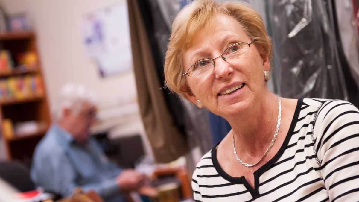 Female business owner, and women-owned business certification holder, at her place of work.